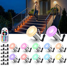 Twelve pack RGBW in-ground well lights showing durable construction with remote control for comprehensive landscape lighting