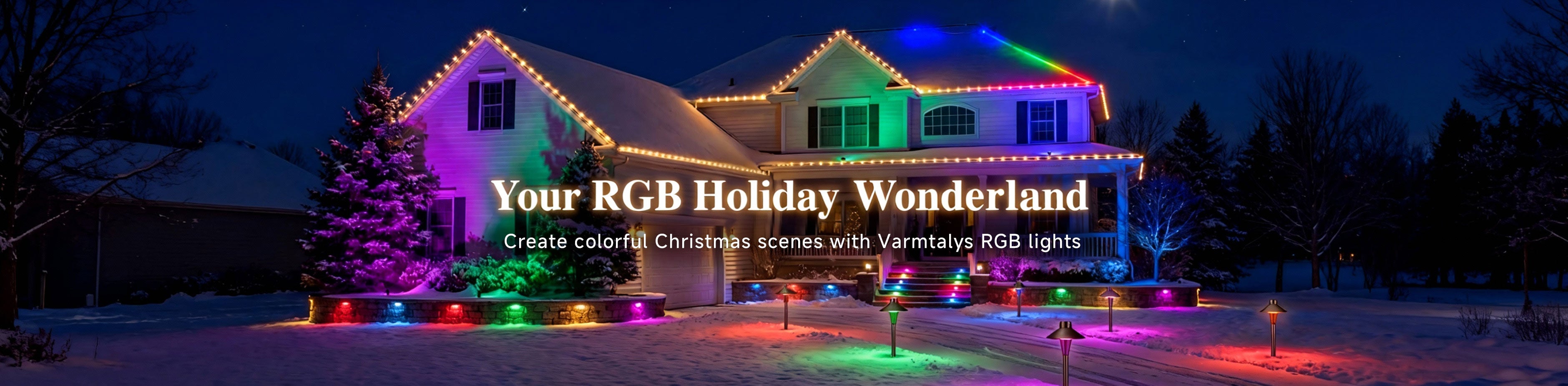 Colorful Christmas house exterior lit with RGB outdoor lights, illuminating the yard, roofline, and snowy landscape at night